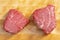 Two Pieces of Raw Beef Tenderloin Steaks