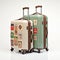 Two pieces of vintage luggage with stickers on outside standing upright isolated on white background