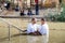 Two pilgrims make an oath during the ceremony of baptism on the Baptismal Site of Jesus Christ - Qasr el Yahud in Israel