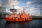 two pilot boats are in the harbor of Luebeck Travemuende