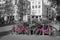 Two pink bikes on the bridge over the channel in Amsterdam