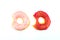 Two pink bitten donuts isolated on white background