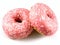 Two pink doughnuts