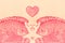 Two pink goldfish and a heart
