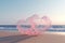 Two pink Heart-shaped transparent bubbles on the beach for wedding decoratio