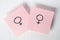 Two pink stickers with gender symbols Venus on white background. Concept lgbt