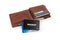 Two plastic discount cards on open brown leather wallet