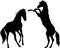 Two playing horses vector silhouette illustration