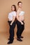 Two plus size women posing in studio and not afraid to show their body