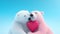 two polar bears hugging each other and holding a pink heart