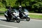 Two police officers riding motorcycles