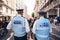 Two Police Officers standing in front of huge crowd of Black Lives Matters protesters heading to Parliament Square, Westminster,