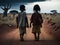 Two poor African children walking on a dirt path