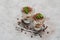 Two portions Classic tiramisu dessert in a glass on concrete background