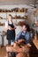 Two potters working with ceramics in atelier