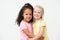 Two Pre School Girls Hugging One Another