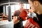 Two professional boxers fighting at the gym