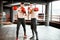 Two professional boxers training at the gym