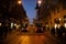 Two public transport, trams captured in the way to square Svobody in Brno, Czech Republic during sunset with lights pop up in city