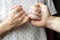 Two quarreling person reconciled and make pinky swear gesture