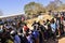 Two queues of people at polling station