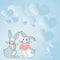 Two rabbits with heart shaped gifts with heartful background demonstrate couples exchanging offerings. Bunnies represent