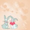 Two rabbits with heart shaped gifts with heartful background demonstrate couples exchanging offerings. Bunnies represent