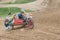 Two racers are riding a sidecar