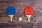 Two rackets for playing table tennis on wooden background