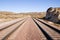 Two railroad tracks in the desert