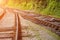 Two railway tracks converge into one and go into perspective. The concept of unification of life paths, a shared future