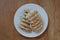 Two Rangi cookies on a white plate