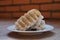 Two Rangi cookies on a white plate