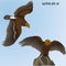 Two realistic golden eagles on gradient background
