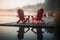 Two red adirondack chairs on a wooden dock on a lake. Generative AI