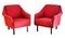 Two red armchairs on white