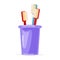 Two red and blue toothbrushes are in violet glass. Family toiletries, oral personal hygiene items.