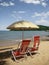 Two red chairs and one umbrella in the beach with a lear blue sky