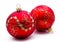 Two red christmas balls isolated
