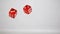 Two red dices in super slow motion rebounding