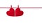 Two red felt hearts hanging on the rope on white background