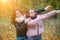 Two red-haired dancing girls on the background of autumn nature, the concept of human emotions