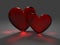 Two red hearts from frosted glass