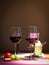 Two redwine glasses with tomato and basil