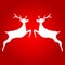 Two Reindeer on red background