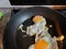 Two rganic free range eggs cooked sunny side up in a non-stick high quality pan