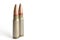 Two rifle bullets isolated on a white background. Military ammunition