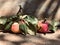 Two ripe red just picked apples with spots and green leaves still life on a shabby wood and rusted metal