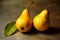 Two ripe yellow pears with a plump appearance