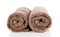 Two rolled brown towels